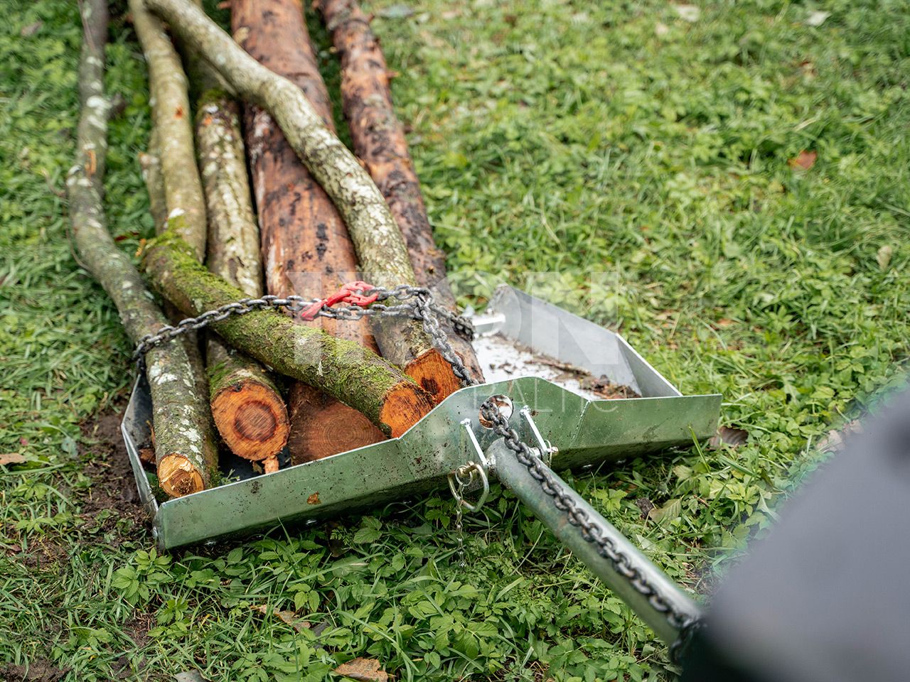 Log skidding plate